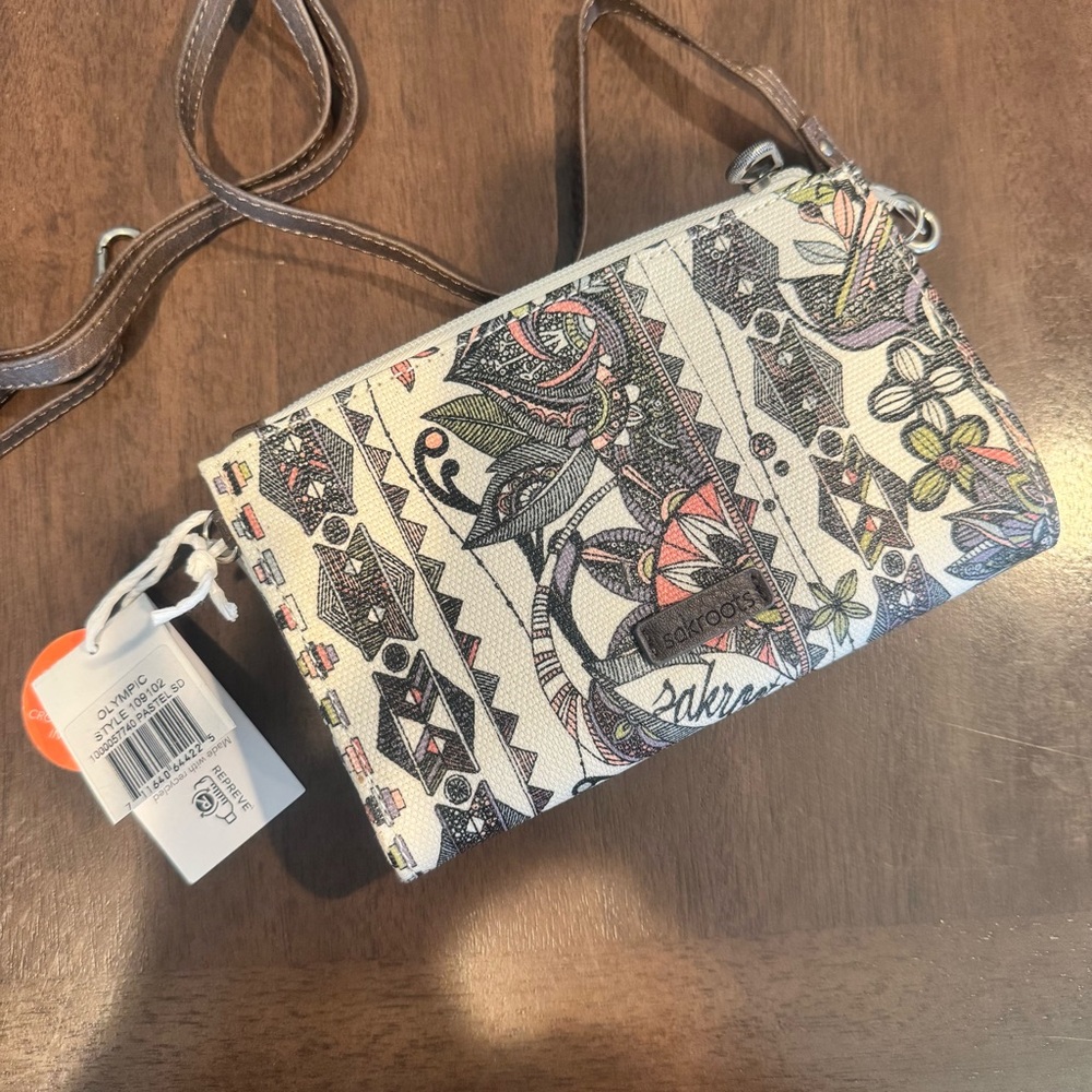 Sakroots Cream and Black Crossbody Bag with Intricate Pattern